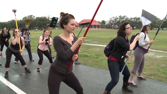 First Female Flambeaux Troupe Puts Swifer To Use