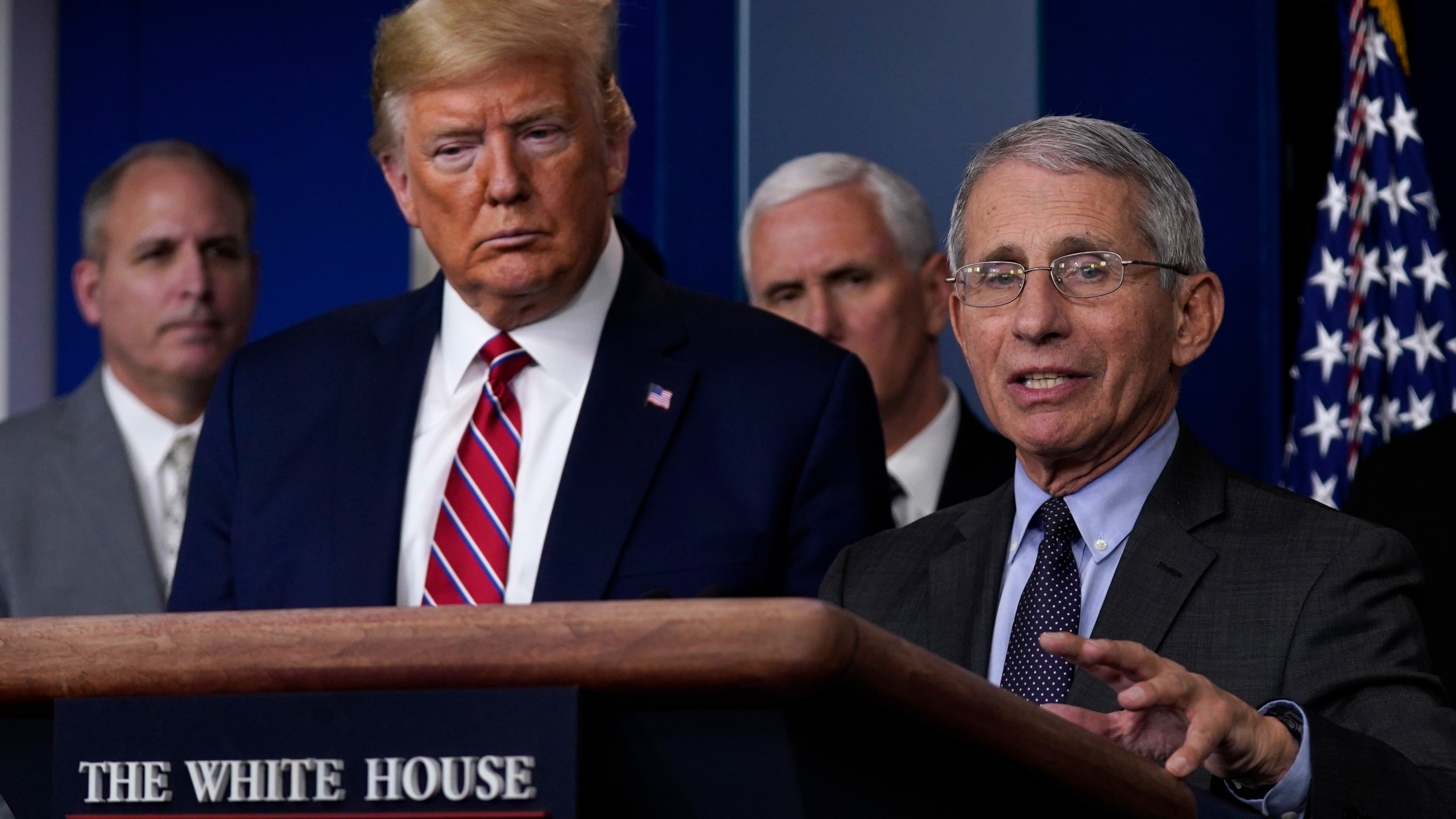 President Donald Trump listens as Director of the National Institute of Allergy and Infectious Diseases Dr. Anthony Fauci speaks during a coronavirus task force briefing at the White House, Friday, March 20, 2020, in Washington. (AP Photo/Evan Vucci)