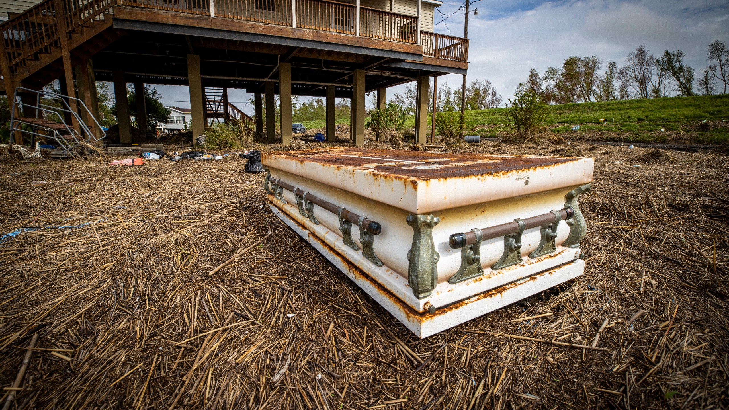 https://digital-stage.wgno.com/news/photos-hurricane-ida-unearths-the-dead-as-caskets-strewn-across-plaquemines-parish/