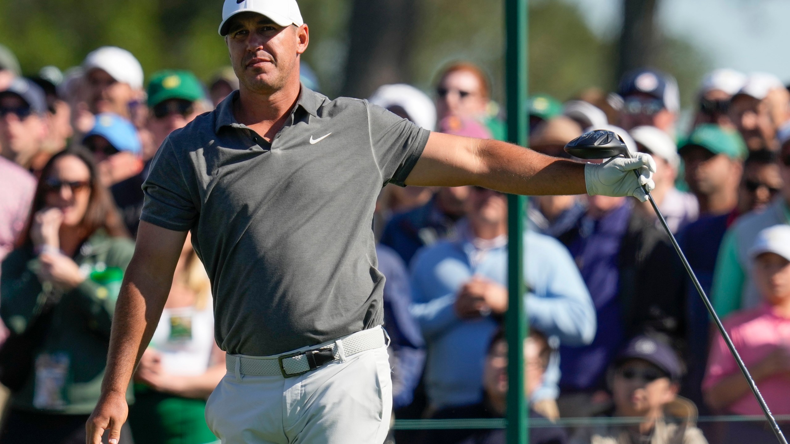 Brooks Koepka watches his tee shot on the eighth hole during the final round of the Masters golf tournament at Augusta National Golf Club on Sunday, April 9, 2023, in Augusta, Ga. (AP Photo/Mark Baker)