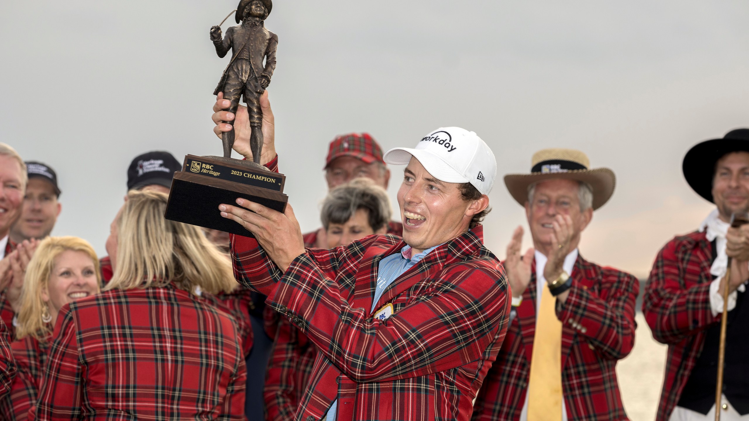 Matt Fitzpatrick, of England, holds the championship trophy after a three-hole playoff during the final round of the RBC Heritage golf tournament, Sunday, April 16, 2023, in Hilton Head Island, S.C. (AP Photo/Stephen B. Morton)