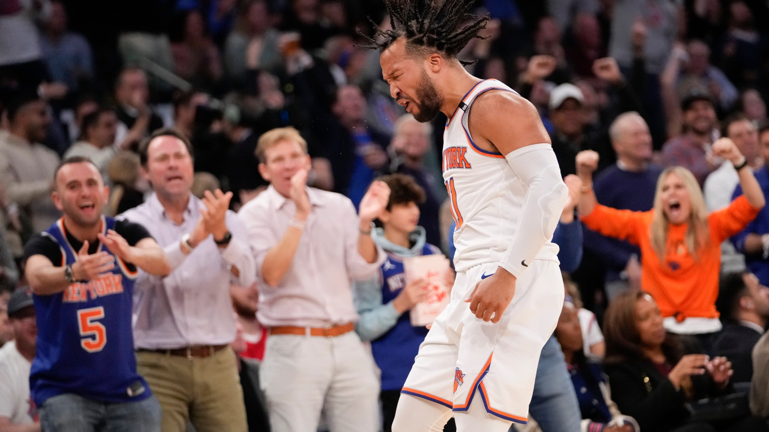 New York Knicks guard Jalen Brunson reacts after scoring a three-point basket in the first half of Game 4 in an NBA basketball first-round playoff series against the Cleveland Cavaliers, Sunday, April 23, 2023, at Madison Square Garden in New York. (AP Photo/Mary Altaffer)
