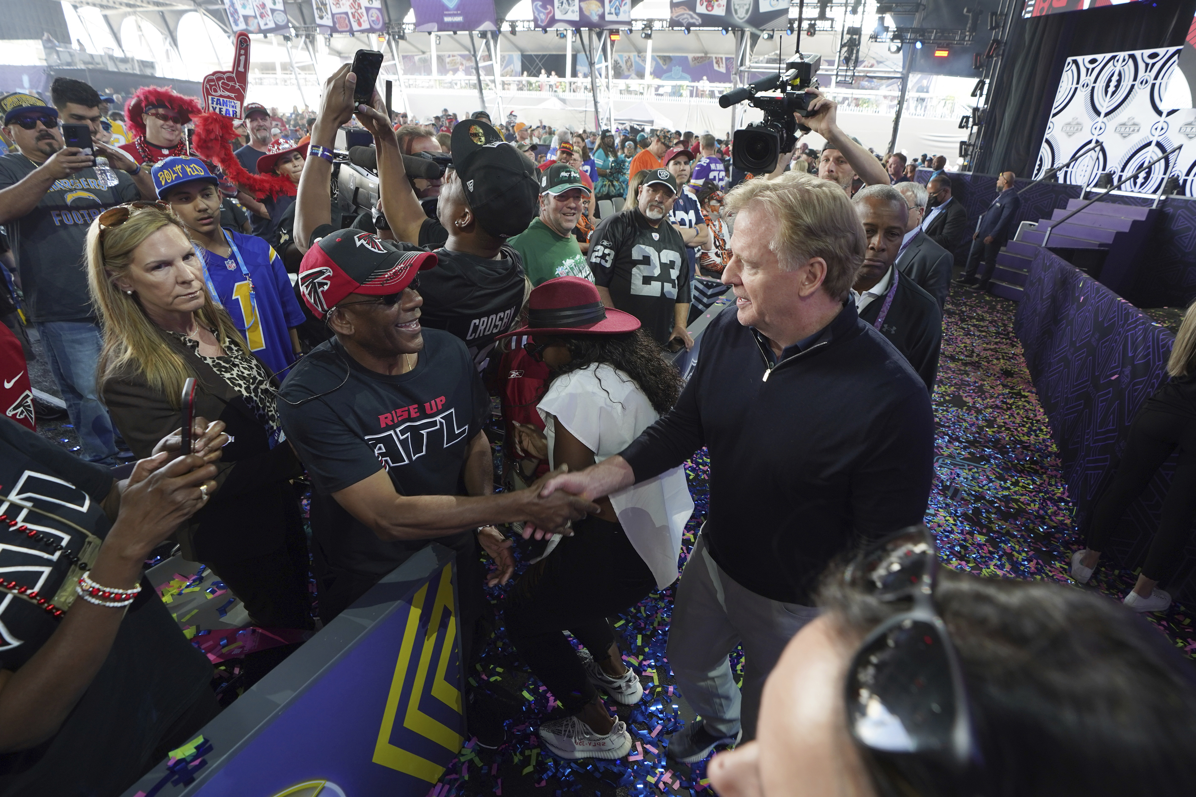 FILE - NFL Commissioner Roger Goodell interacts with fans during the 2022 NFL Draft in Las Vegas, Saturday, April 30, 2022. Despite opposition from the major sports leagues, the high court overturned a federal law – the 1992 Professional Amateur Sports Protection Act – that had barred betting on football, basketball, baseball and other sports in most states. (AP Photo/Doug Benc, File)