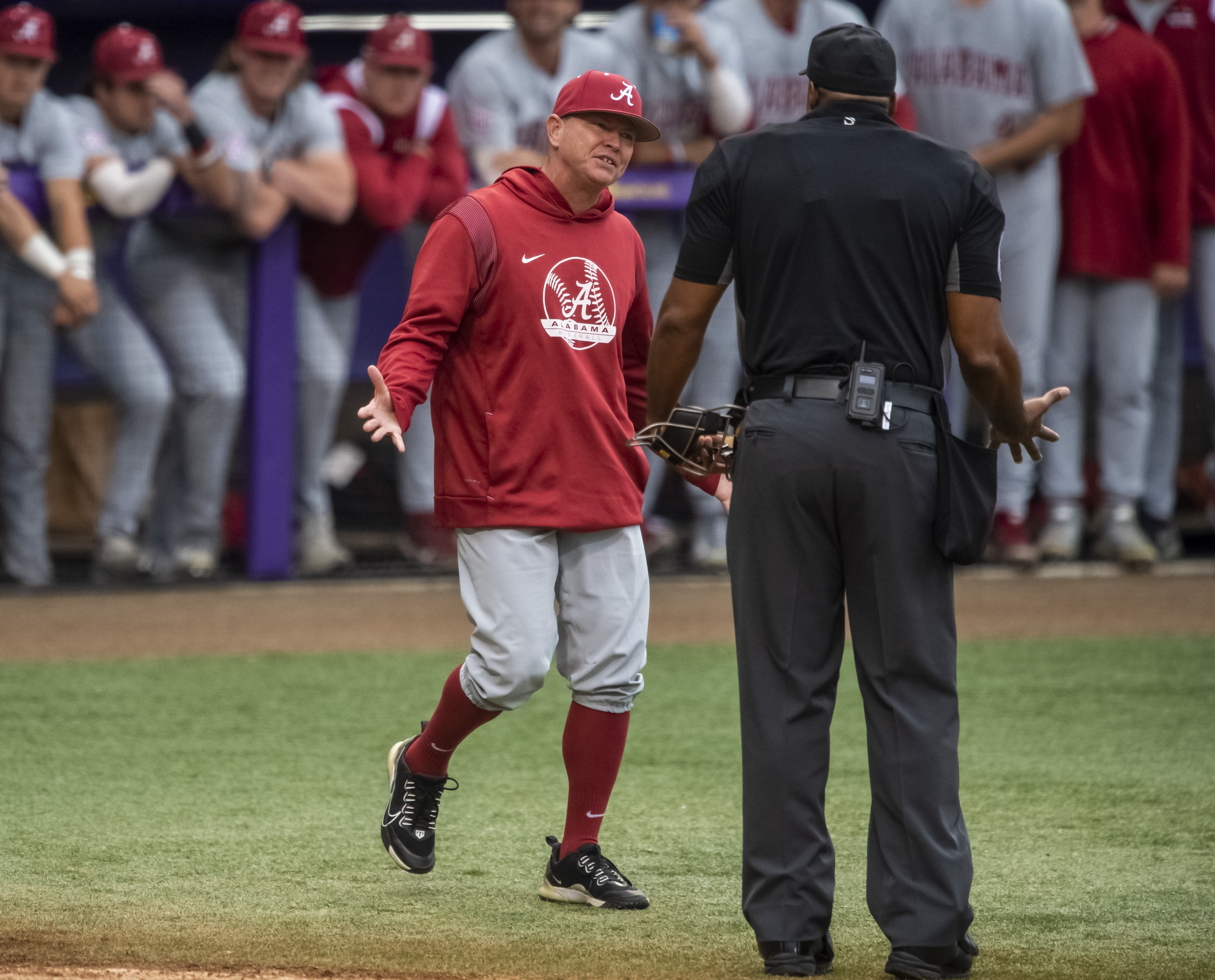 Alabama head coach Brad Bohannon, left, argues with umpire Joe Harris after being tossed from an NCAA college baseball game in the bottom of the second inning against LSU, Saturday, April 29, 2023, in Baton Rouge, Louisiana./The Advocate via AP)