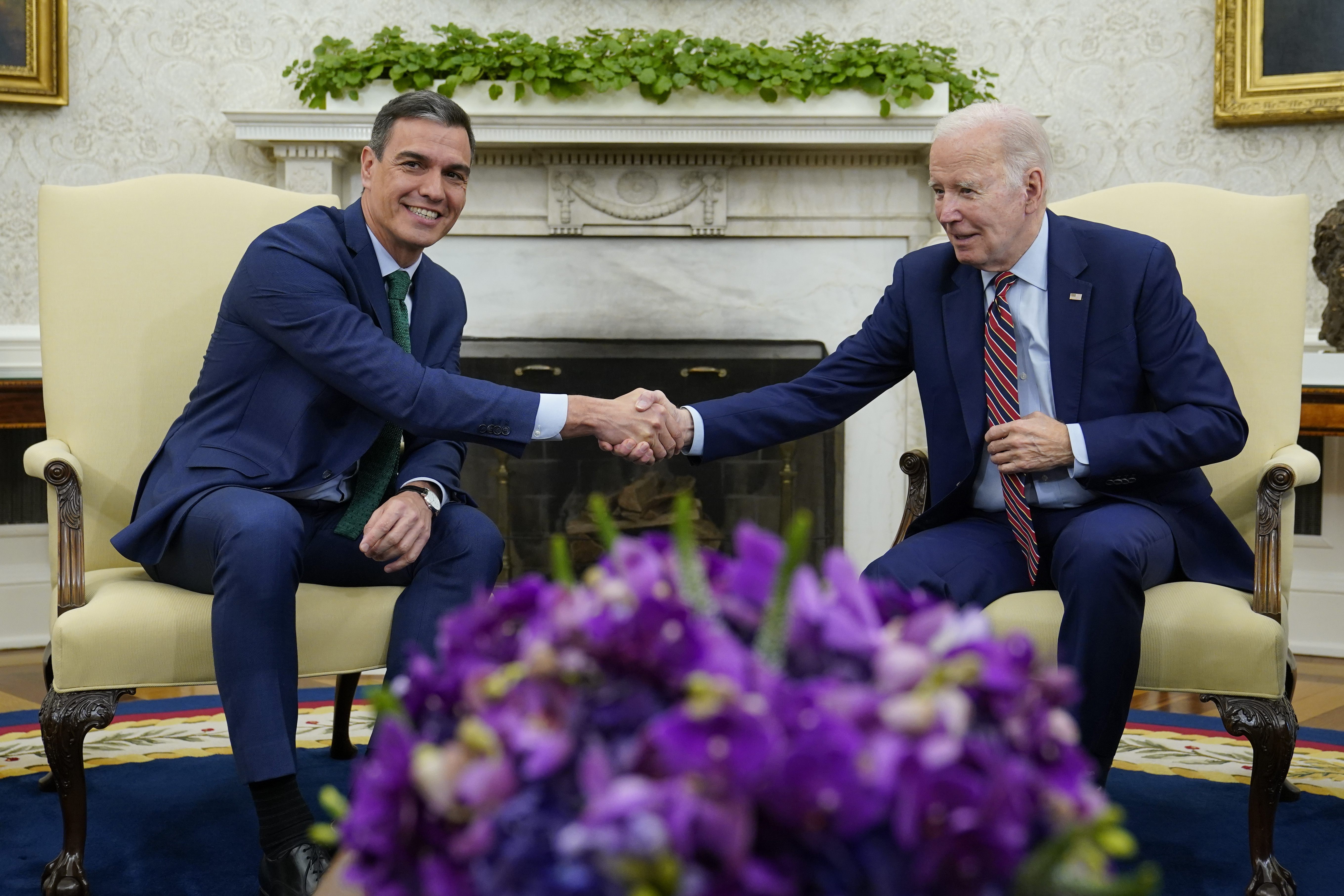 President Joe Biden shakes hands with Spain's Prime Minister Pedro Sanchez as they meet in the Oval Office of the White House in Washington, Friday, May 12, 2023. (AP Photo/Susan Walsh)