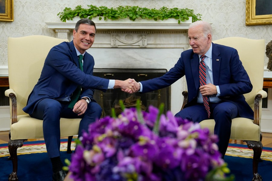 President Joe Biden shakes hands with Spain's Prime Minister Pedro Sanchez as they meet in the Oval Office of the White House in Washington, Friday, May 12, 2023. (AP Photo/Susan Walsh)