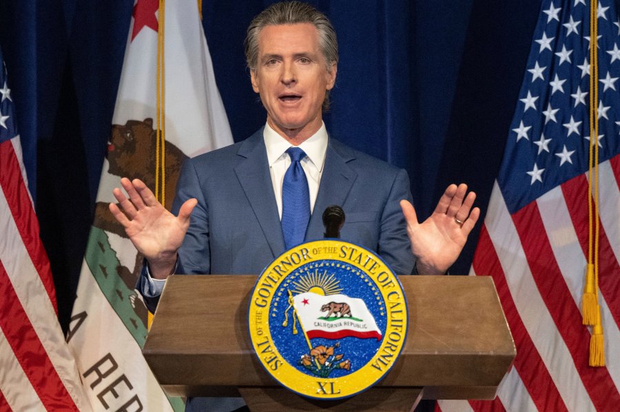 California Gov. Gavin Newsom announces the May budget revision on Friday, May 12, 2023 in Sacramento, Calif. Newsom said Friday the state's budget deficit has grown to nearly $32 billion. That's about $10 billion more than predicted in January, when the governor offered his first budget proposal. (Hector Amezcua/The Sacramento Bee via AP)