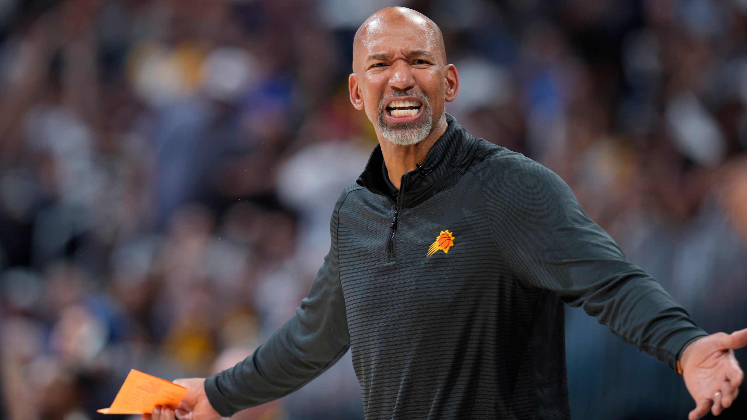 Phoenix Suns coach Monty Williams argues for a call during the second half of Game 5 of the team's NBA Western Conference basketball semifinal playoff series against the Denver Nuggets on Tuesday, May 9, 2023, in Denver. (AP Photo/David Zalubowski)