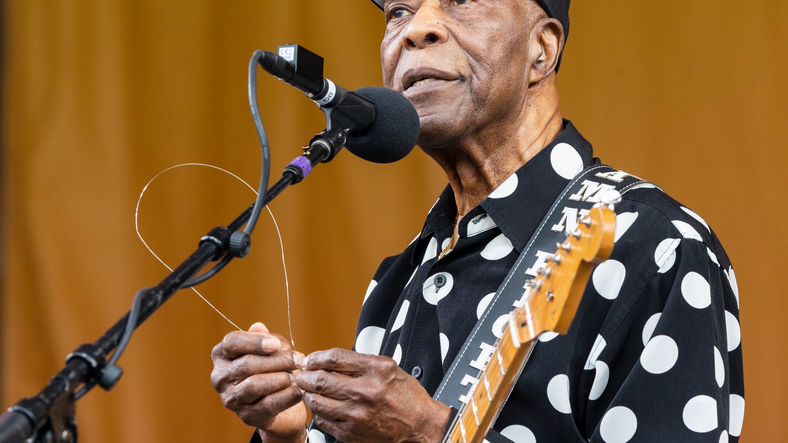FILE - Buddy Guy plays with one of his guitar strings after it broke off during his performance on the Festival Stage at the New Orleans Jazz & Heritage Festival, May 4, 2023, in New Orleans. Blues mainstays Buddy Guy, Albert Castiglia and John Nemeth each won two awards and Tommy Castro took home the prize of B.B. King Entertainer of the Year at the Blues Music Awards in Memphis, Tenn., Thursday, May 11. (Chris Granger/The Times-Picayune/The New Orleans Advocate via AP, File)