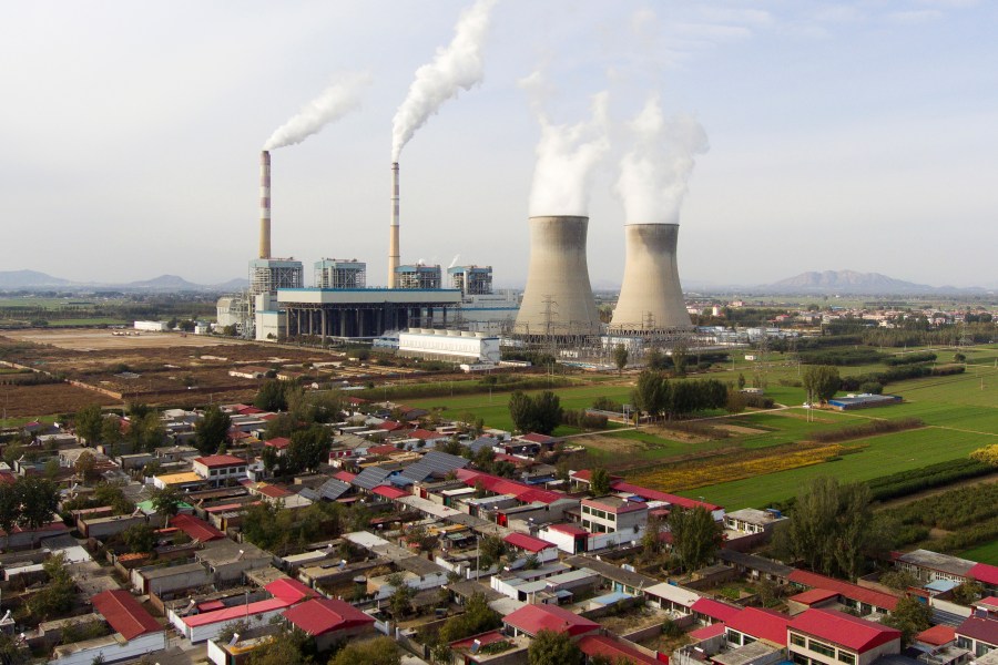 Guohua Power Station, a coal-fired power plant, operates in Dingzhou, Baoding, in the northern China's Hebei province, Friday, Nov. 10, 2023. (AP Photo/Ng Han Guan)