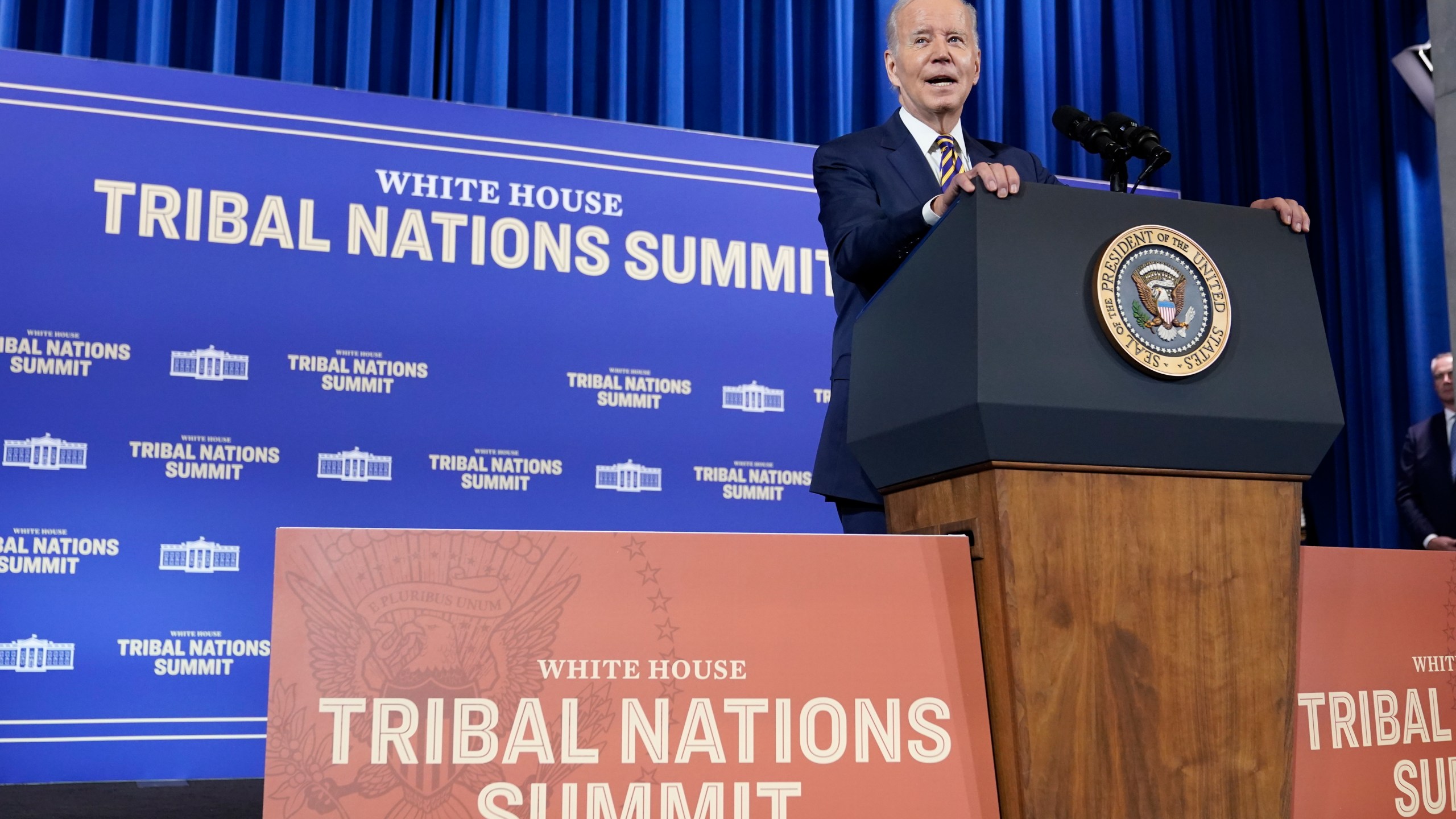 FILE - President Joe Biden speaks at the White House Tribal Nations Summit at the Department of the Interior in Washington, Nov. 30, 2022. Biden will sign an executive order during a 2023 tribal nations summit that aims to make it easier for Native Americans to access federal funding and have greater autonomy over how to invest those funds. (AP Photo/Patrick Semansky, File)