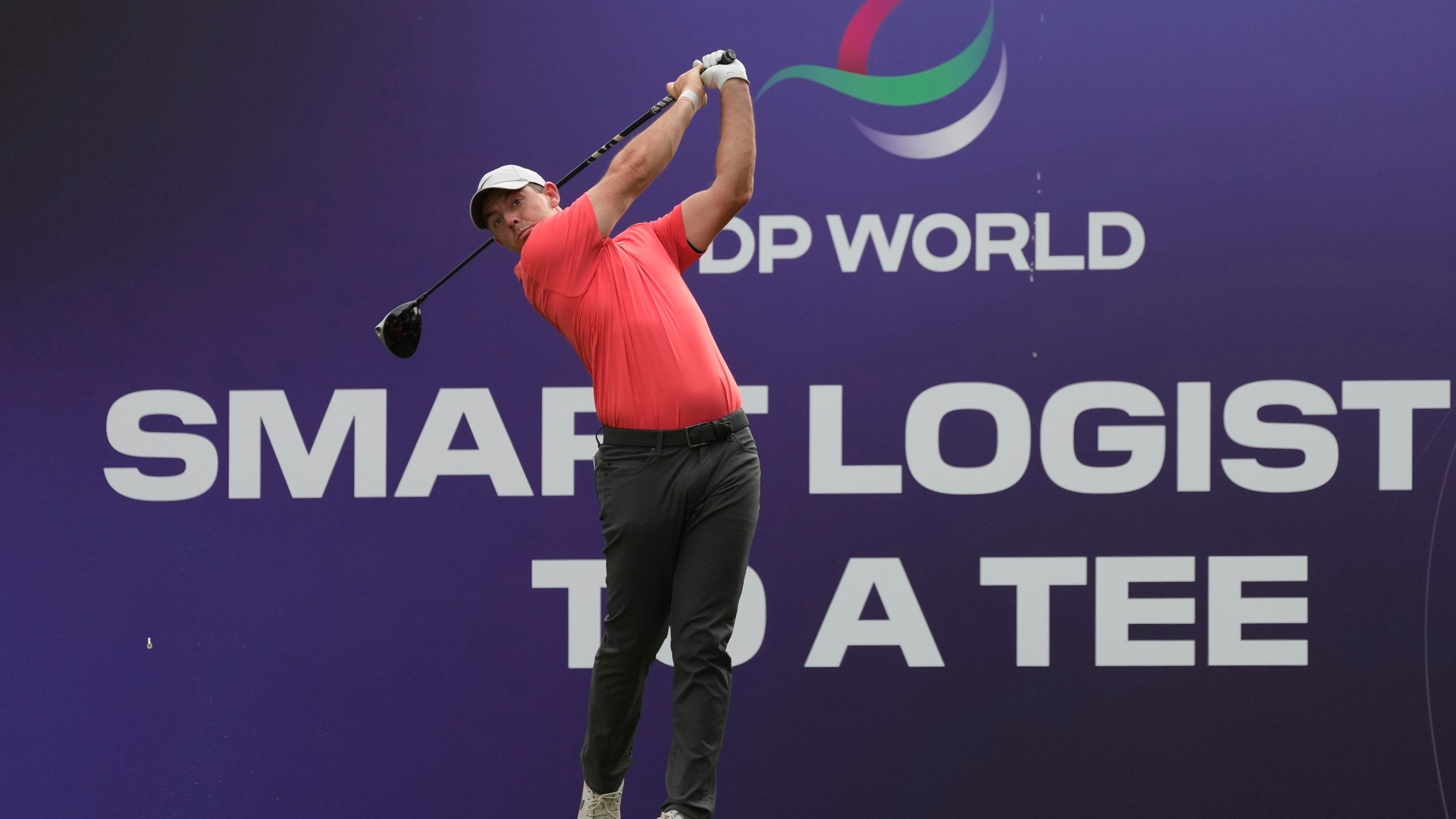 Rory McIlroy of Northern Ireland tees off on the 15th hole during the round one of the DP World Tour Championship golf tournament, in Dubai, United Arab Emirates, Thursday, Nov. 16, 2023. (AP Photo/Kamran Jebreili)