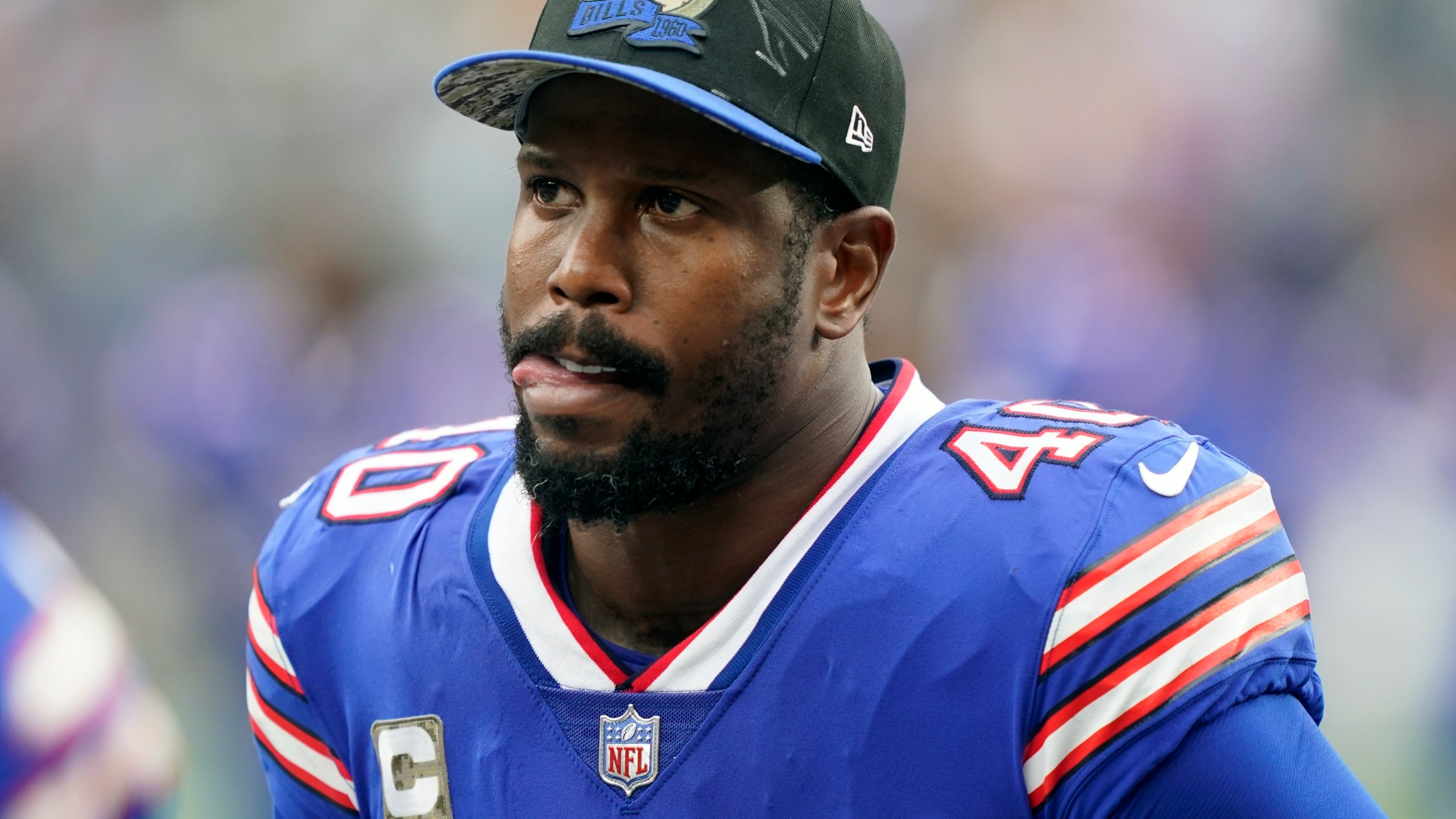 FILE - Buffalo Bills linebacker Von Miller reacts during the first half of an NFL football game against the New York Jets, Sunday, Nov. 6, 2022, in East Rutherford, N.J. Miller has turned himself in to police in a Dallas suburb after he was charged in a warrant with domestic violence against the mother of his children, who is pregnant. (AP Photo/John Minchillo, File)