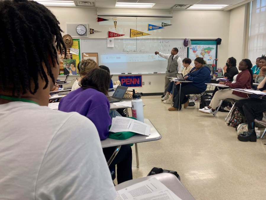 FILE - Emmitt Glynn teaches to a group of Baton Rouge Magnet High School students, Jan. 30, 2023, in Baton Rouge, La. On Wednesday, Dec. 6, 2023, the College Board released an updated framework for its new Advanced Placement African American Studies course, months after the non-profit testing company came under intense scrutiny for engaging with conservative critics. (AP Photo/Stephen Smith, File)