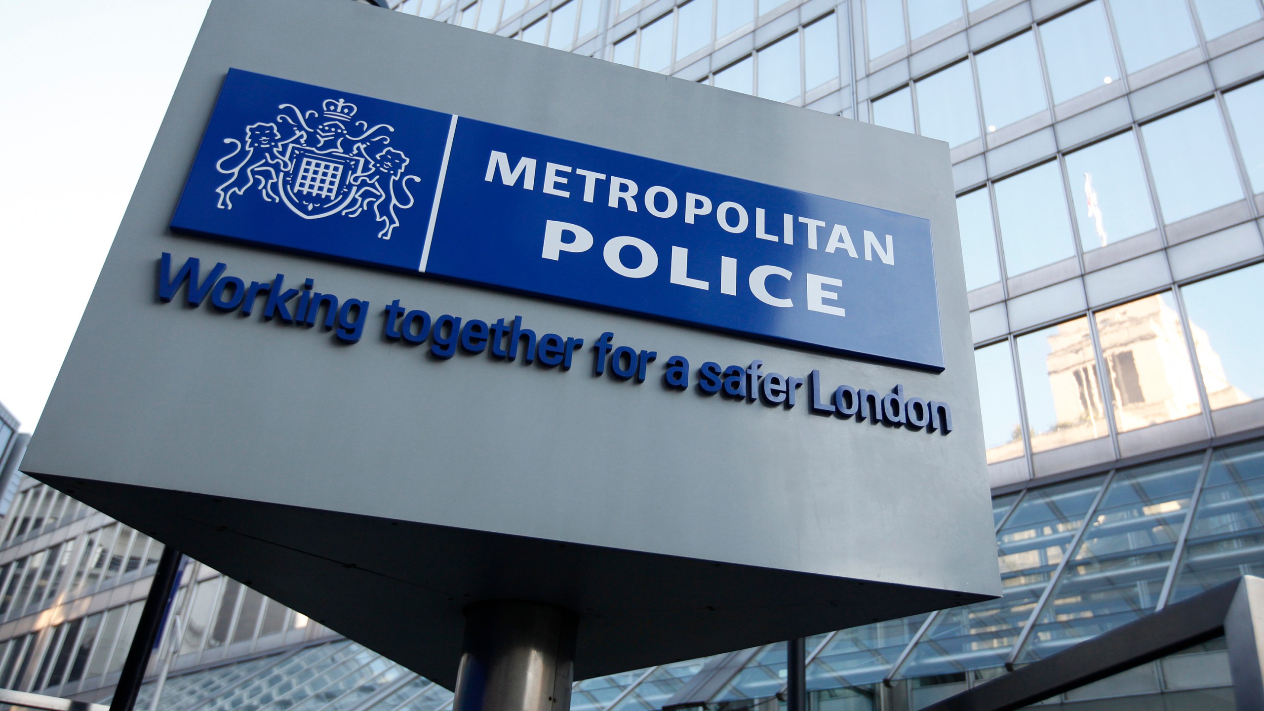 FILE - A general view of New Scotland Yard, the headquarters of the London Metropolitan Police on Feb. 3, 2012. London police have charged a deputy U.S. Marshal in the United Kingdom with entering an aircraft while drunk after he was arrested on allegations of misconduct aboard a flight from New York. The 39-year-old was arrested on Thursday, Dec. 7, 2023, upon arrival at Heathrow Airport. (AP Photo/Alastair Grant, File)