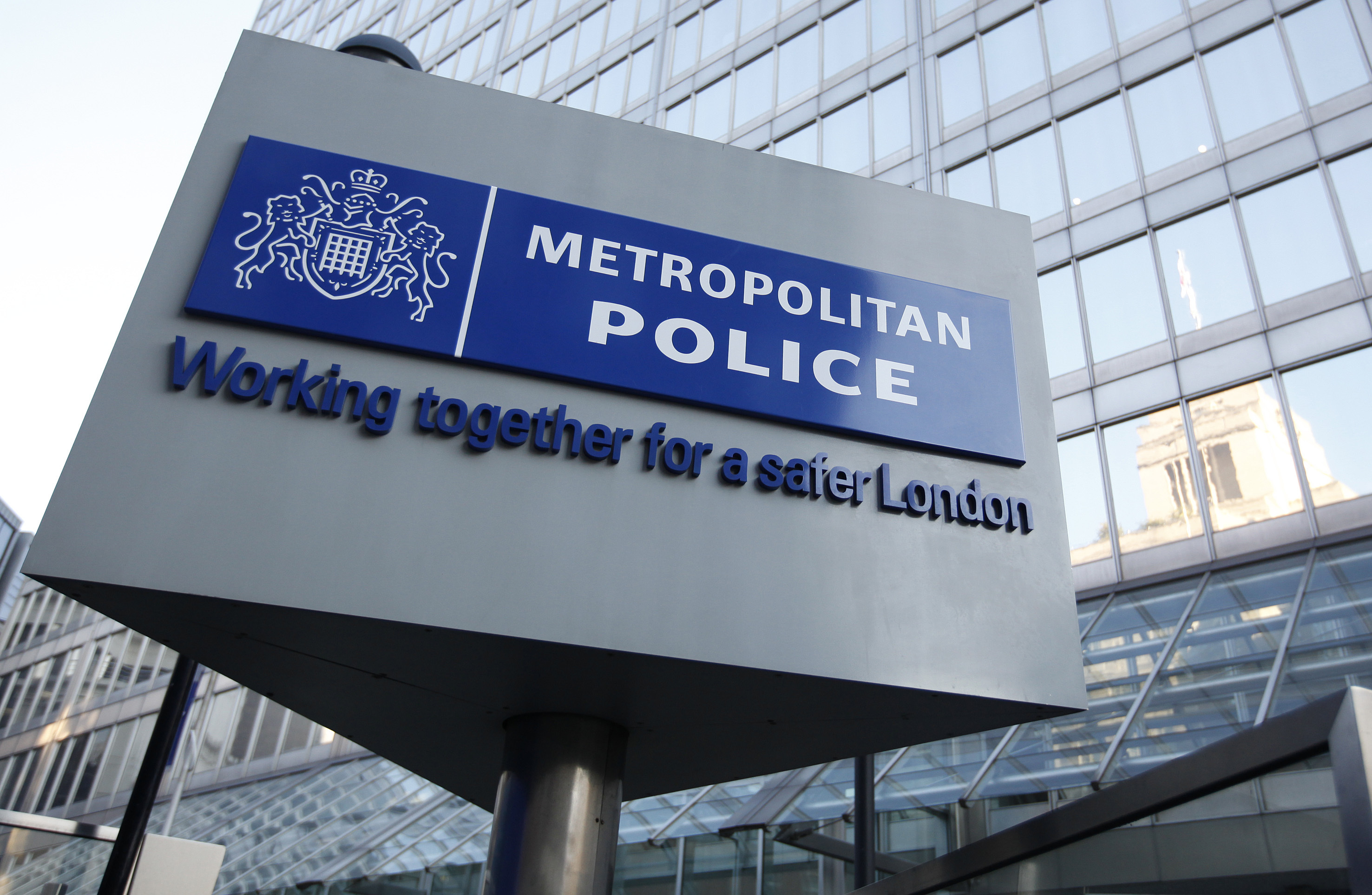 FILE - A general view of New Scotland Yard, the headquarters of the London Metropolitan Police on Feb. 3, 2012. London police have charged a deputy U.S. Marshal in the United Kingdom with entering an aircraft while drunk after he was arrested on allegations of misconduct aboard a flight from New York. The 39-year-old was arrested on Thursday, Dec. 7, 2023, upon arrival at Heathrow Airport. (AP Photo/Alastair Grant, File)