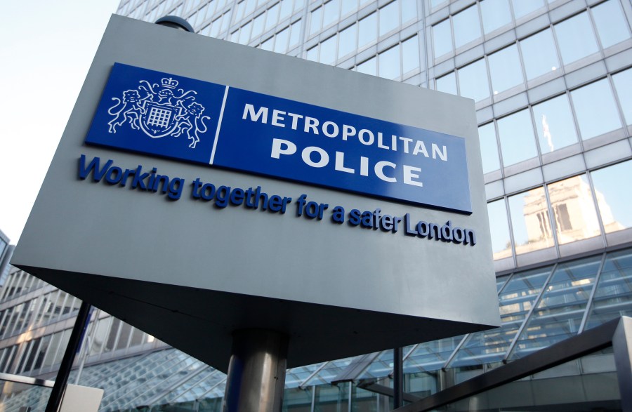 FILE - A general view of New Scotland Yard, the headquarters of the London Metropolitan Police on Feb. 3, 2012. London police have charged a deputy U.S. Marshal in the United Kingdom with entering an aircraft while drunk after he was arrested on allegations of misconduct aboard a flight from New York. The 39-year-old was arrested on Thursday, Dec. 7, 2023, upon arrival at Heathrow Airport. (AP Photo/Alastair Grant, File)