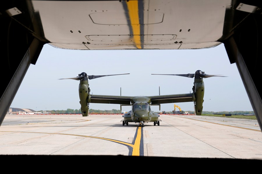 FILE - A U.S. Marine Corps Osprey aircraft taxies behind an Osprey carrying members of the White House press corps at Andrews Air Force Base, Md., on April 24, 2021. When the U.S. military took the extraordinary step of grounding its fleet of V-22 Ospreys this week, it wasn't reacting just to the recent deadly crash of the aircraft off the coast of Japan. The aircraft has had a long list of problems in its short history. (AP Photo/Patrick Semansky, File)