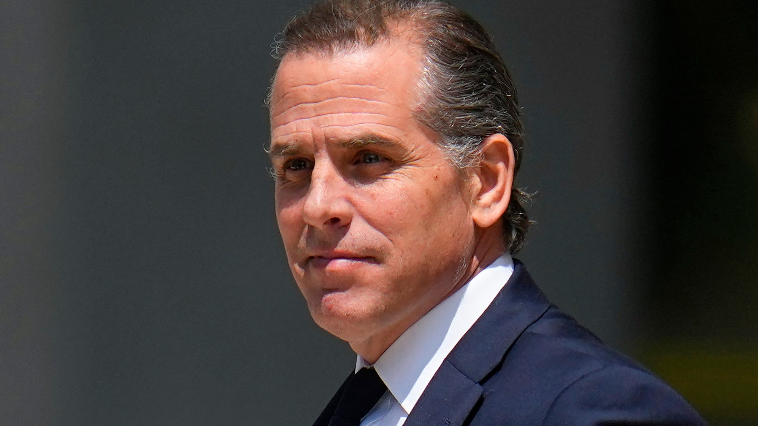 FILE - President Joe Biden's son, Hunter Biden, leaves after a court appearance, July 26, 2023, in Wilmington, Del. House Republicans are warning Hunter Biden that they will move to hold him in contempt of Congress if he doesn’t appear this month for a closed-door deposition, raising the stakes in the growing standoff over testimony from President Joe Biden's son. (AP Photo/Julio Cortez, File)