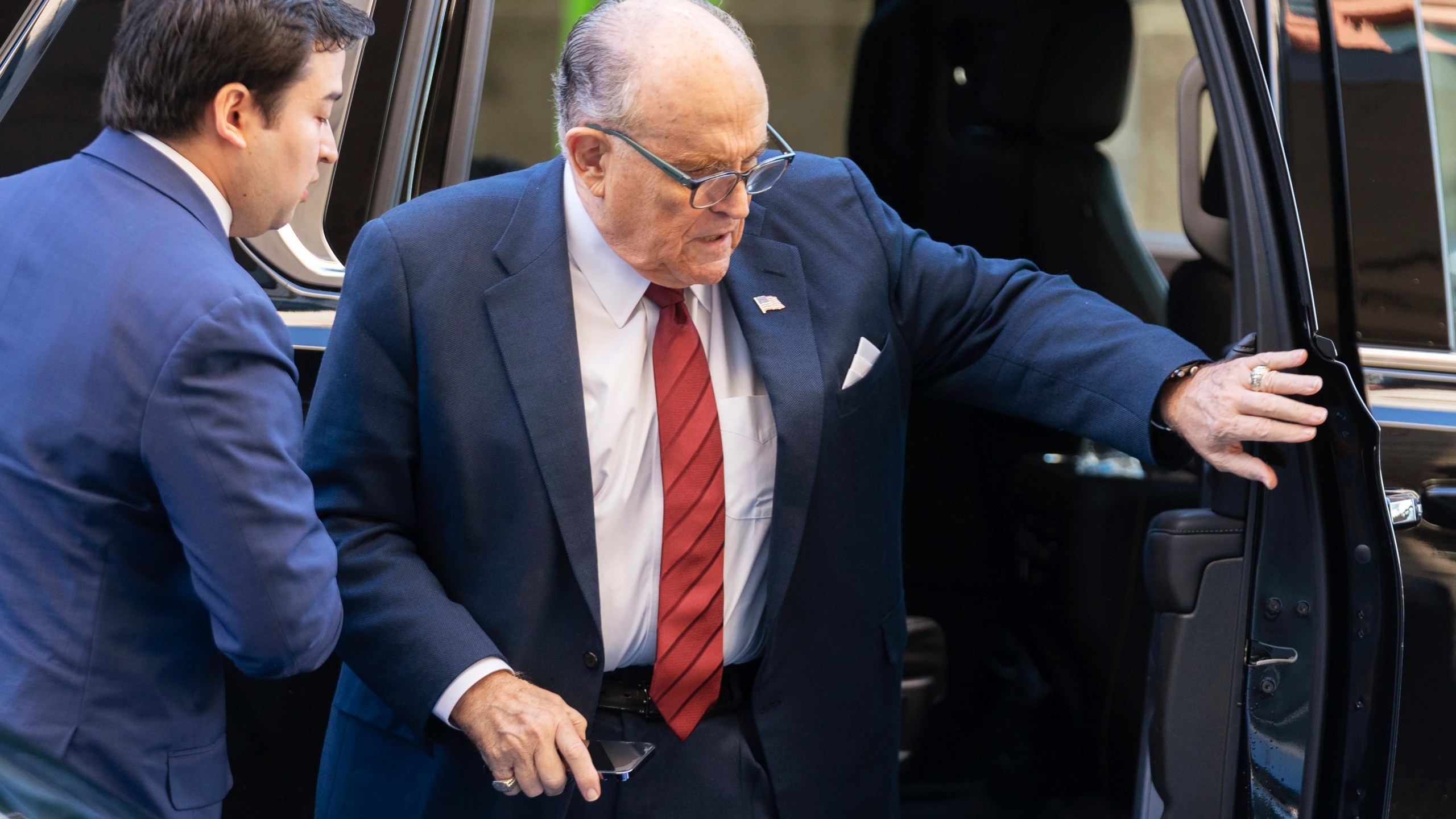 Former Mayor of New York Rudy Giuliani arrives at the federal courthouse in Washington, Monday, Dec. 11, 2023. The trial will determine how much Giuliani will have to pay two Georgia election workers who he falsely accused of fraud while pushing President Donald Trump's baseless claims after he lost the 2020 election. (AP Photo/Jose Luis Magana)