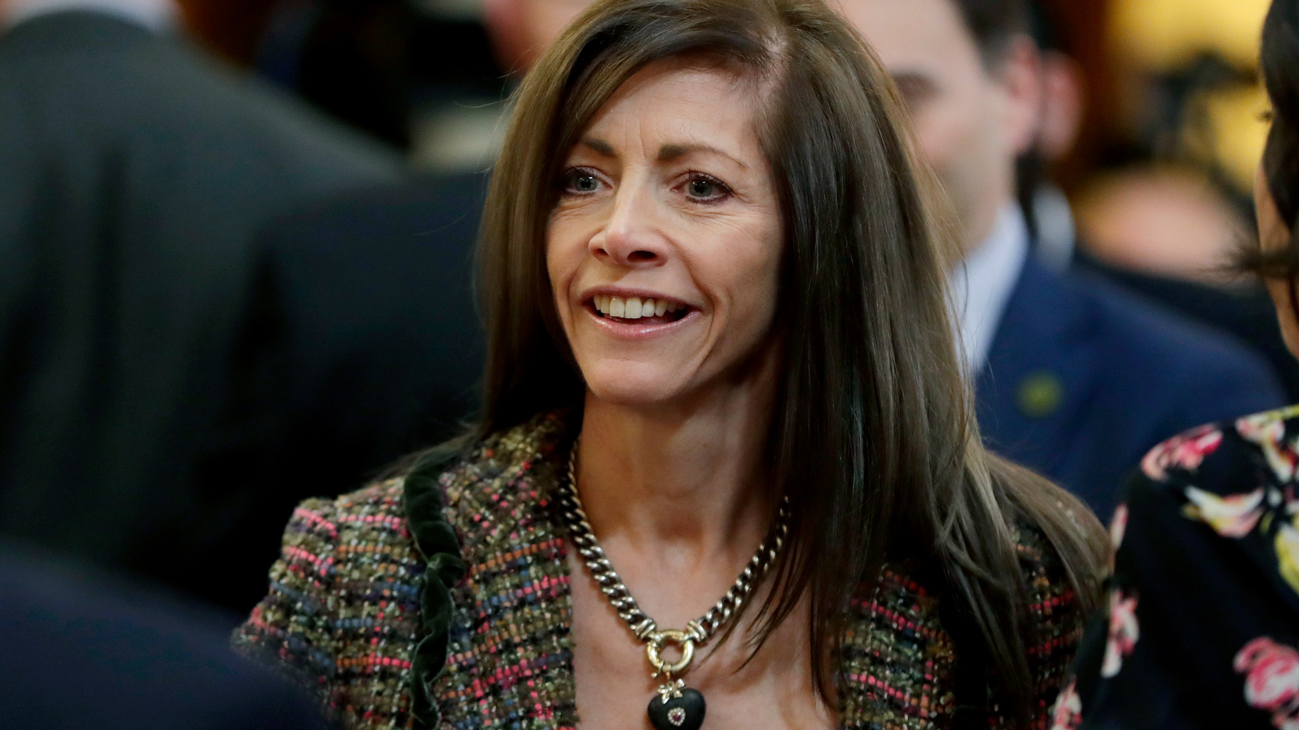 FILE - New Jersey first lady Tammy Murphy arrives at the Statehouse Assembly chambers prior to Gov. Phil Murphy's first State of the State address, Jan. 15, 2019, in Trenton, N.J. As Democratic Party leaders have called on Bob Menendez to resign amid a federal corruption case against him, a field of robust primary challengers has already emerged including Murphy and has begun to win significant support from county party officials. (AP Photo/Julio Cortez, File)