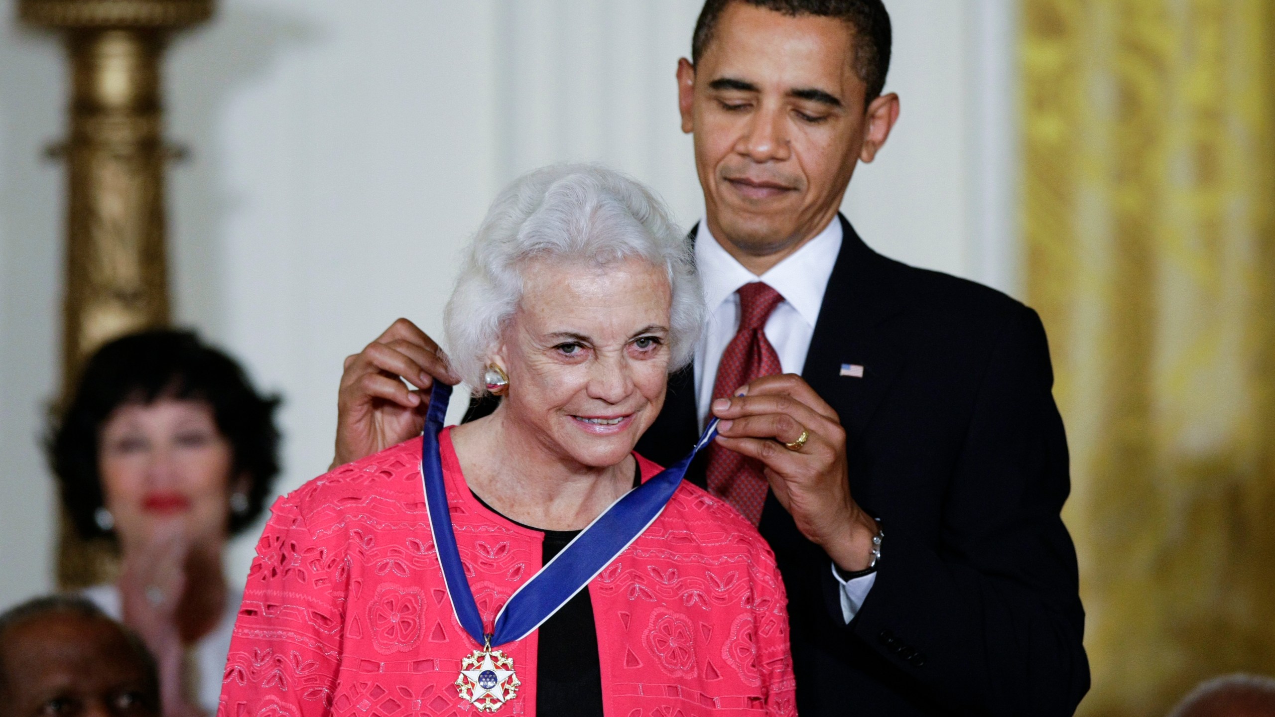 FILE - President Barack Obama presents the 2009 Presidential Medal of Freedom to Sandra Day O'Connor, Aug. 12, 2009. The late Justice Sandra Day O'Connor, the first woman to serve on the Supreme Court and an unwavering voice of moderate conservatism for more than two decades, will lie in repose in the court's Great Hall on Monday, Dec. 18, 2023. (AP Photo/J. Scott Applewhite, File)