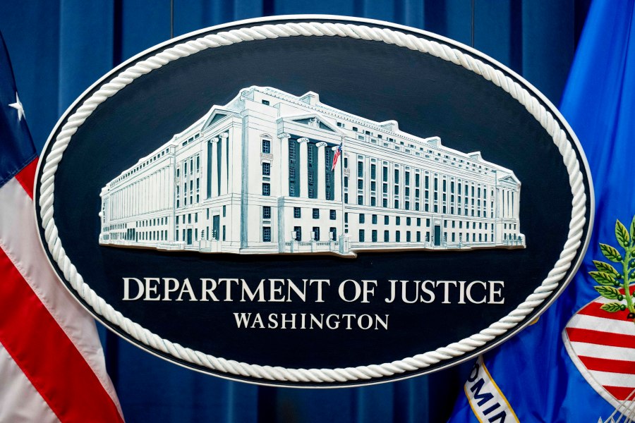FILE - The Justice Department in Washington, Nov. 18, 2022. The U.S. Justice Department has created a database to track records of misconduct by federal law enforcement officers that is aimed at preventing agencies from unknowingly hiring problem officers, officials said on Monday. Dec. 18, 2023. (AP Photo/Andrew Harnik, File)